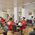 Low-wage worksite gathered for lunch in the cafeteria.