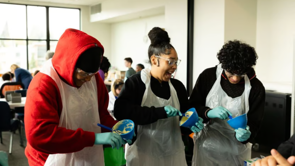 Youth mix cast to take molds of teeth as a part of the Dental Career Discovery program.